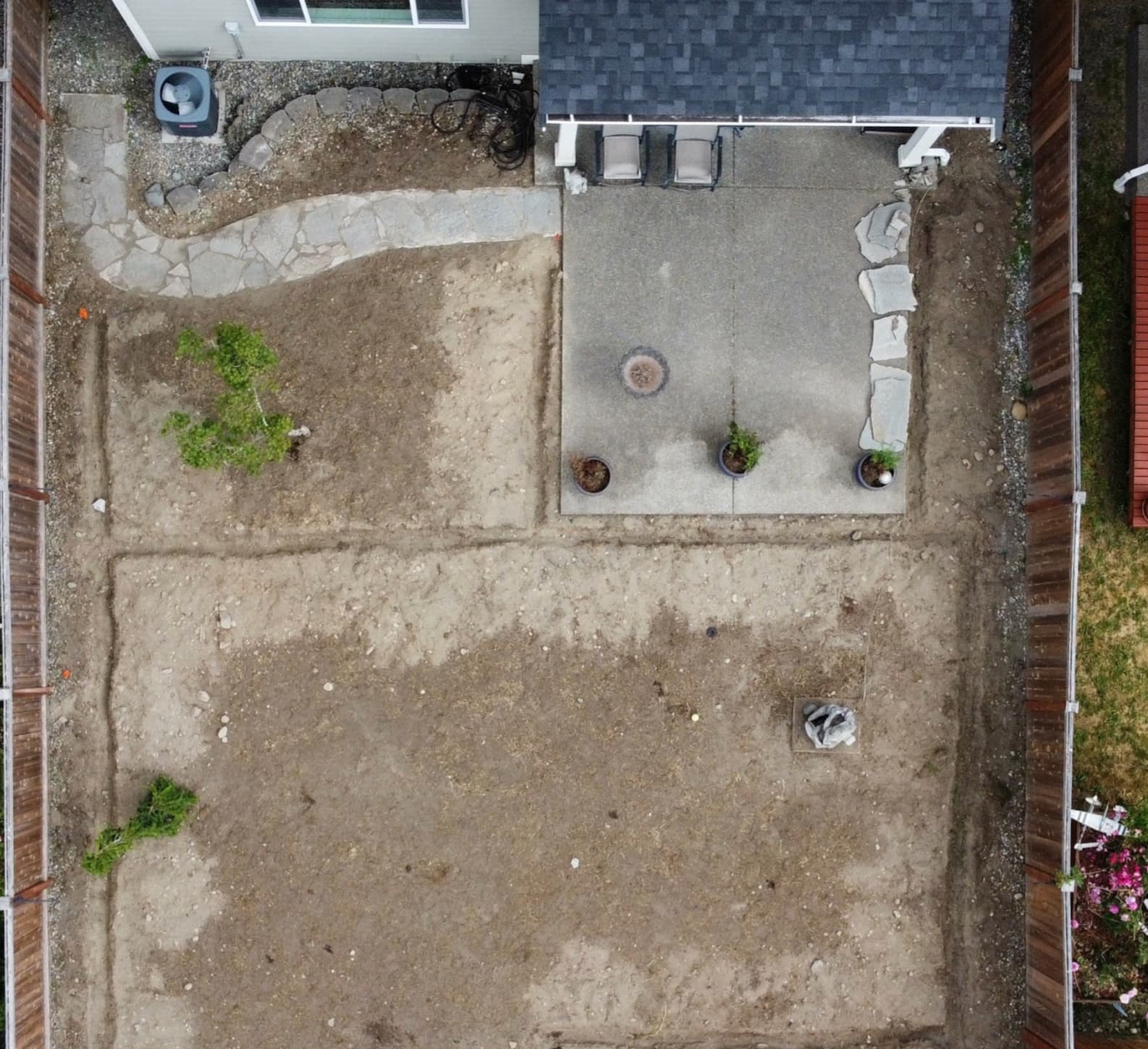 During full yard renovation showing active grading and site preparation in Tacoma WA